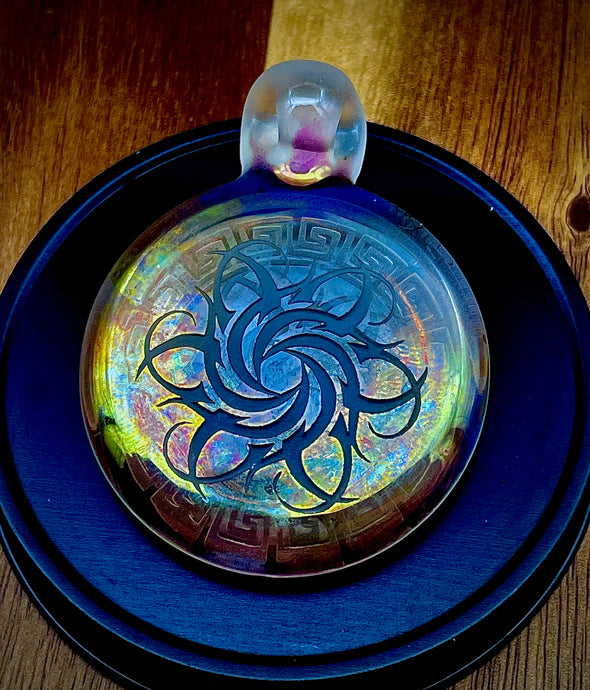Fumed and Carved Pendant By Alkaline Glass